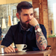 Illustration for article titled Yep, Your Cool Wrist Tattoo Is Confusing Your EVEN COOLER Apple Watch